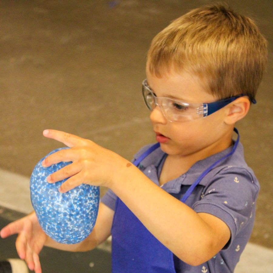 The Slime Factory 100 Kellogg Lane Child playing with slime