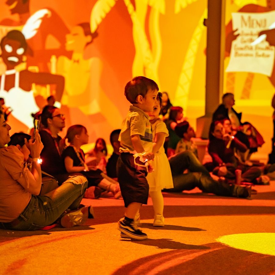 a toddler is watching something in the show